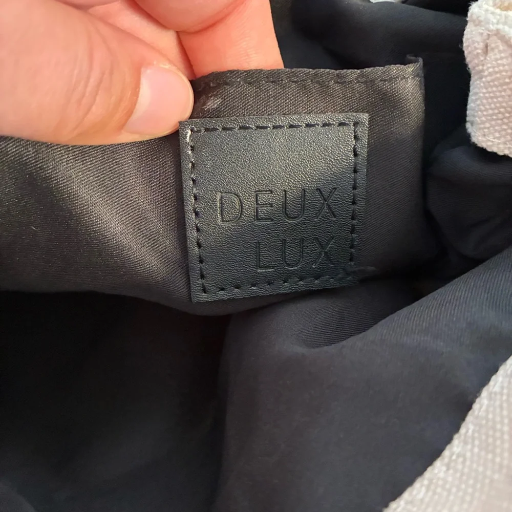Deux Lux Backpack Canvas Backpack Beige White Black Leather Diaper Bag Flap
